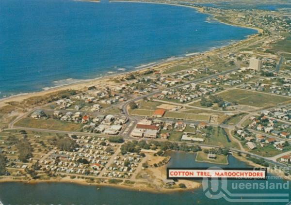 <span class="caption-caption">Cotton Tree, Maroochydore. Cotton Tree camping ground, with the first high rise on the Sunshine Coast in the middleground.</span>, 1975. <br />Postcard by <span class="caption-publisher">Bernard Kuskopf</span>, collection of <span class="caption-contributor">Centre for the Government of Queensland</span>.