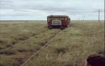 <span class="caption-caption">Tram crossing Black Soil Plains, Aramac</span>, 1974. <br />Slide, collection of <span class="caption-contributor">Andrew Plunkett</span>.