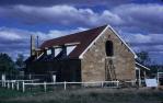 <span class="caption-caption">Stone store house being restored, now living quarters for staff, Jimbour House, Dalby</span>, 1974. <br />Slide, collection of <span class="caption-contributor">Allan Webb</span>.