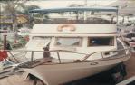 <span class="caption-caption">A Cheoy Lee cruiser as a raffle prize, Currumbin</span>, c1970s. <br />Slide, collection of <span class="caption-contributor">Robin Barron</span>.