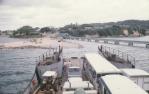 <span class="caption-caption">Landing at Dunwich with Baby Clinic on board as well as coaches and a tractor, Moreton Bay</span>, 1975. <br />Slide, collection of <span class="caption-contributor">Robin Barron</span>.