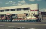 <span class="caption-caption">Buy Queensland Made float, Warana parade on Barry Parade, Fortitude Valley</span>, c1970. <br />Slide, collection of <span class="caption-contributor">Robin Barron</span>.