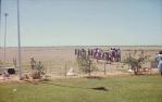 <span class="caption-caption">Scouts forming a guard of honour for Governor's visit, Winton airport</span>, c1980s. <br />Slide, collection of <span class="caption-contributor">Bernie Searle & Loretta Searle</span>.