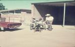 <span class="caption-caption">Goat cart preparation, Winton festival</span>, 1974. <br />Slide, collection of <span class="caption-contributor">Bernie Searle & Loretta Searle</span>.