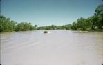 <span class="caption-caption">Boating on dam after floods at ‘Bodalla’ between Quilpie and Windorah</span>, 1973. <br />Slide, collection of <span class="caption-contributor">Dennis Costigan</span>.