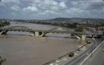 <span class="caption-caption">William Jolly Bridge during flood, Brisbane</span>, 1974. <br />Slide, collection of <span class="caption-contributor">Doug Rumsey</span>.