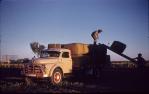 <span class="caption-caption">Loading wool, Blackall Shire</span>, 1960s. <br />Slide, collection of <span class="caption-contributor">Gayle Ahearn</span>.