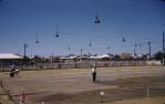 <span class="caption-caption">Watering the new greens at the Bowling Club, Barcaldine</span>, 1964. <br />Slide, collection of <span class="caption-contributor">Gladys Hartland</span>.