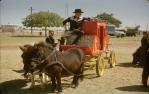 <span class="caption-caption">Dodge City coach in festival parade, Barcaldine</span>, 1962. <br />Slide, collection of <span class="caption-contributor">Gladys Hartland</span>.