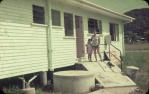 <span class="caption-caption">Low-set home in Edge Hill, with septic tank at front of house</span>, 1968. <br />Slide, collection of <span class="caption-contributor">George Laws</span>.