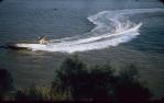 <span class="caption-caption">Water skiiing on St Lucia reach, Brisbane</span>, 1957. <br />Slide, collection of <span class="caption-contributor">Heatherbell Mellor</span>.