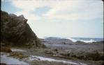 <span class="caption-caption">Rocks and water, Currumbin Beach</span>, 1960. <br />Slide, collection of <span class="caption-contributor">John Boult</span>.