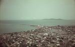 <span class="caption-caption">Ross Creek and Townsville harbour</span>, 1975. <br />Slide, collection of <span class="caption-contributor">John Donohue</span>.