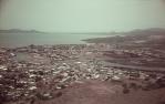 <span class="caption-caption">Townsville city centre with South Townsville across Ross Creek</span>, 1975. <br />Slide, collection of <span class="caption-contributor">John Donohue</span>.