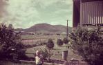 <span class="caption-caption">Caroline Street, Aitkenvale, with Mount Stuart</span>, 1970. <br />Slide, collection of <span class="caption-contributor">John Donohue</span>.