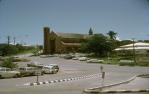 <span class="caption-caption">St James Cathedral with the white, modernist sculpture of the saint, dubbed 'Slim Jim' by locals, Melton Hill, Townsville</span>, 1970. <br />Slide, collection of <span class="caption-contributor">John Donohue</span>.