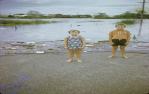 <span class="caption-caption">Tantitha Street flood with children, Bundaberg</span>, 1971. <br />Slide, collection of <span class="caption-contributor">John Hampson</span>.