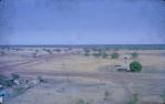 <span class="caption-caption">The small white building on the right is a Catholic church, used for all denominations, on the outskirts of Normanton</span>, 1973. <br />Slide, collection of <span class="caption-contributor">John Hindmarsh</span>.