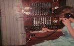 <span class="caption-caption">Manual telephone exchange, photographed as the auto-exchange was being completed, Talwood</span>, 1965. <br />Slide, collection of <span class="caption-contributor">Jim McDougall</span>.