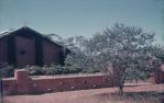 <span class="caption-caption">St Pauls Anglican Church, with rose garden, Talwood. The interior was decorated with wood inlay by Gordon Black</span>, 1965. <br />Slide, collection of <span class="caption-contributor">Jim McDougall</span>.