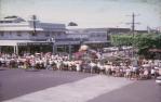 <span class="caption-caption">The Fun in the Sun parade, looking up Shields Street, Cairns</span>, 1965. <br />Slide, collection of <span class="caption-contributor">Jim McDougall</span>.