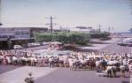<span class="caption-caption">The Fun in the Sun parade, looking up Shields Street, Cairns</span>, 1965. <br />Slide, collection of <span class="caption-contributor">Jim McDougall</span>.
