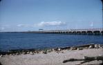 <span class="caption-caption">Hornibrook Bridge seen from the Sandgate side</span>, c1960s. <br />Slide, collection of <span class="caption-contributor">John Thun</span>.