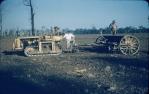 <span class="caption-caption">Planting barley Durong, D4 with 24 run shear combine</span>, c1956. <br />Slide, collection of <span class="caption-contributor">John Thun</span>.