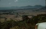<span class="caption-caption">From Kuranda Range towards Cairns airport</span>, c1958. <br />Slide, collection of <span class="caption-contributor">John Thun</span>.