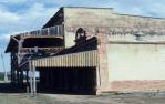 <span class="caption-caption">Thorp's buildings, Ravenswood</span>, c1980s. <br />Slide, collection of <span class="caption-contributor">Marie Hayes</span>.