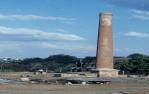 <span class="caption-caption">Chimney on mine site, Ravenswood</span>, c1980s. <br />Slide, collection of <span class="caption-contributor">Marie Hayes</span>.