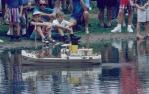 <span class="caption-caption">Model boats on Tygum Lagoon, Waterford West</span>, 1992. <br />Slide, collection of <span class="caption-contributor">Marie Hayes</span>.