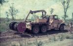 <span class="caption-caption">Mack truck running out telecommunication cable, Banana Shire</span>, 1975. <br />Slide, collection of <span class="caption-contributor">Neville Sim</span>.