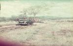 <span class="caption-caption">Running out telecommunication cable with a Keiser truck and D7 tractor, Banana Shire</span>, 1975. <br />Slide, collection of <span class="caption-contributor">Neville Sim</span>.