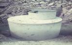 <span class="caption-caption">In the absence of other housing for telecommunication repeaters, new septic tanks were used, Banana Shire</span>, 1975. <br />Slide, collection of <span class="caption-contributor">Neville Sim</span>.