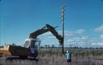 <span class="caption-caption">Redundant telephone-wire pole is pulled from the ground, Chinchilla Shire</span>, 1979. <br />Slide, collection of <span class="caption-contributor">Neville Sim</span>.