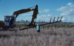 <span class="caption-caption">Redundant telephone-wire pole is pulled from the ground, Chinchilla Shire</span>, 1979. <br />Slide, collection of <span class="caption-contributor">Neville Sim</span>.