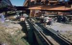 <span class="caption-caption">During construction, the north end of the rail bridge was moved on rollers and pushed by tractors, Indooroopilly</span>, 1957. <br />Slide, collection of <span class="caption-contributor">Oswald  Endacott</span>.