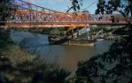 <span class="caption-caption">The rail bridge, looking down the Brisbane River towards St Lucia, Indooroopilly</span>, 1957. <br />Slide, collection of <span class="caption-contributor">Oswald  Endacott</span>.