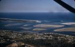 <span class="caption-caption">Aerial view of the Spit and the Broadwater, Southport</span>, 1957. <br />Slide, collection of <span class="caption-contributor">Patrick Conaghan</span>.