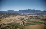 <span class="caption-caption">University of Queensland Bushwalking Club (UQBWC) view toward the Scenic Rim from Mt Minto near Croftby</span>, 1958. <br />Slide, collection of <span class="caption-contributor">Patrick Conaghan</span>.
