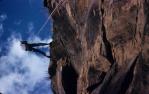 <span class="caption-caption">University of Queensland Bushwalking Club (UQBWC) Kangaroo Point Cliffs, Ronald T. Cox, abseiling down cliff</span>, 1959. <br />Slide, collection of <span class="caption-contributor">Patrick Conaghan</span>.