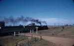 <span class="caption-caption">“Westlander” passenger-train leaving Roma pulled by two steam-locomotives (diesel-locomotives were too heavy for the bridges west of Roma)</span>, c1959. <br />Slide, collection of <span class="caption-contributor">Patrick Conaghan</span>.