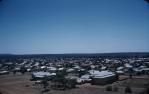 <span class="caption-caption">View over Roma from top of water-tower on Hospital Hill</span>, c1959. <br />Slide, collection of <span class="caption-contributor">Patrick Conaghan</span>.