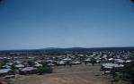 <span class="caption-caption">View over Roma from top of water-tower on Hospital Hill</span>, c1959. <br />Slide, collection of <span class="caption-contributor">Patrick Conaghan</span>.