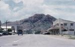<span class="caption-caption">Looking up Gregory Street to Castle Hill, with Townsville General Hospital on the left</span>, 1962. <br />Slide, collection of <span class="caption-contributor">Peter Petersen</span>.