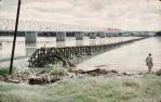 <span class="caption-caption">The old railway bridge and the Silver Link road and rail bridge over the Burdekin River</span>, 1958. <br />Slide, collection of <span class="caption-contributor">Peter Petersen</span>.