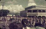 <span class="caption-caption">Corner of Spence and Lake Streets, Fun in the Sun festival, Cairns</span>, c1960s. <br />Slide, collection of <span class="caption-contributor">Rex Grattidge</span>.