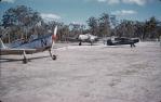 <span class="caption-caption">Chipmonk, Hudson, Piper Cub at Stanthorpe aerodrome</span>, 1958. <br />Slide, collection of <span class="caption-contributor">Richard Hopkins</span>.