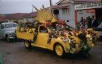 <span class="caption-caption">Mr Pownall, town gardener, in his vehicle at the Centenary procession, Redcliffe</span>, 1959. <br />Slide, collection of <span class="caption-contributor">Richard Hopkins</span>.